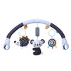A baby stroller arch toy featuring a curved bar with hanging plush charms including a panda and a striped bead.