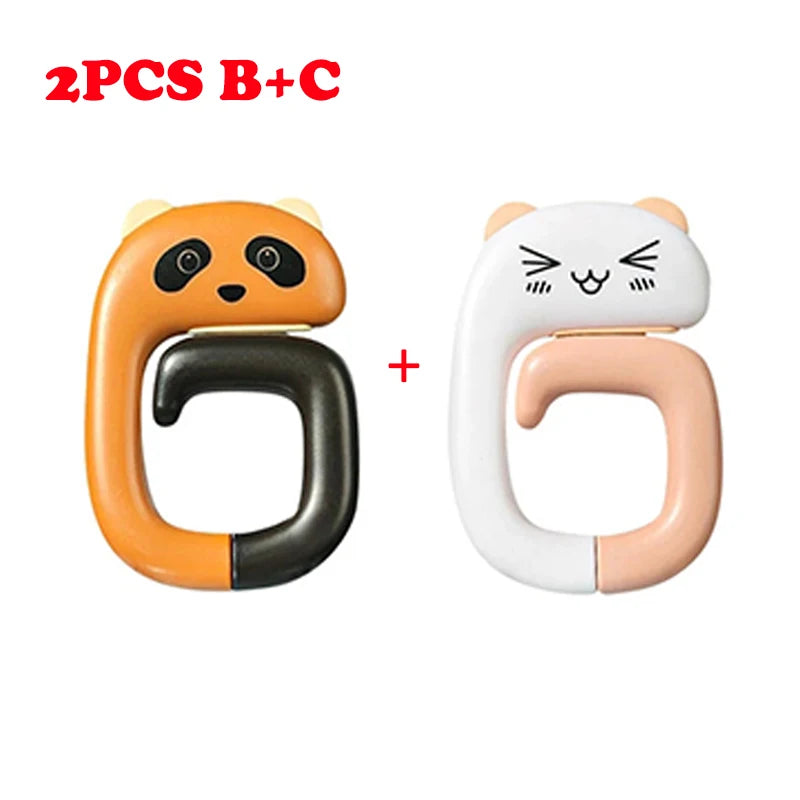 Two pairs of cute animal-themed bag hooks, one orange and black panda, and one white cat.
