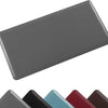 A gray anti-fatigue standing mat with a waterproof non-slip surface shown from an angle.