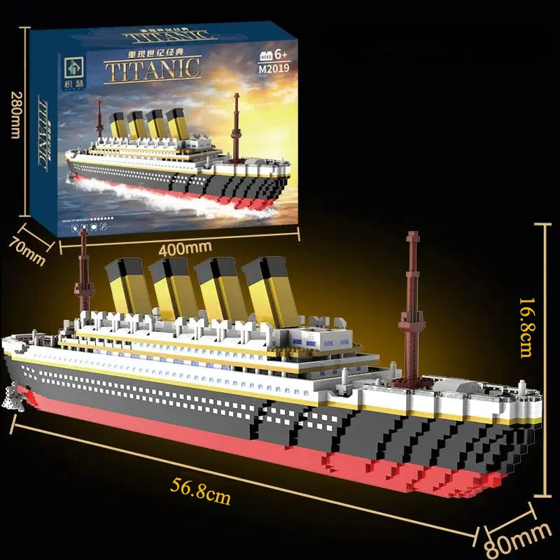 A scale model of the Titanic ship built from interlocking plastic blocks, shown in a side view.