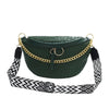 A dark green woven pattern waist bag with a gold chain strap is shown against a white background.