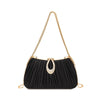 Black pleated evening clutch with a gold rhinestone loop and a gold chain strap