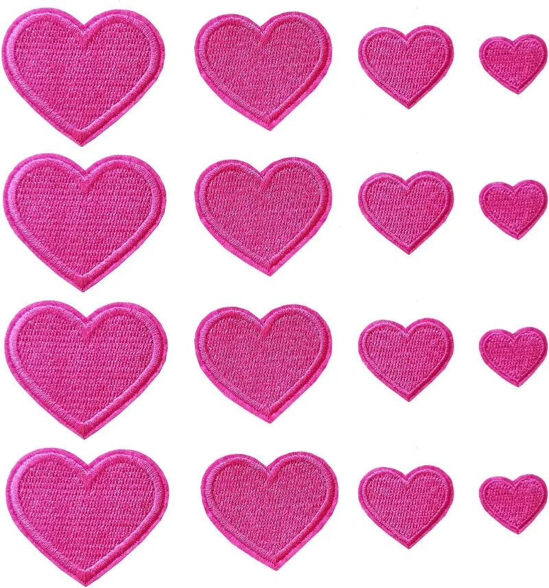 A collection of twenty-four pink embroidered heart iron-on patches in various sizes.