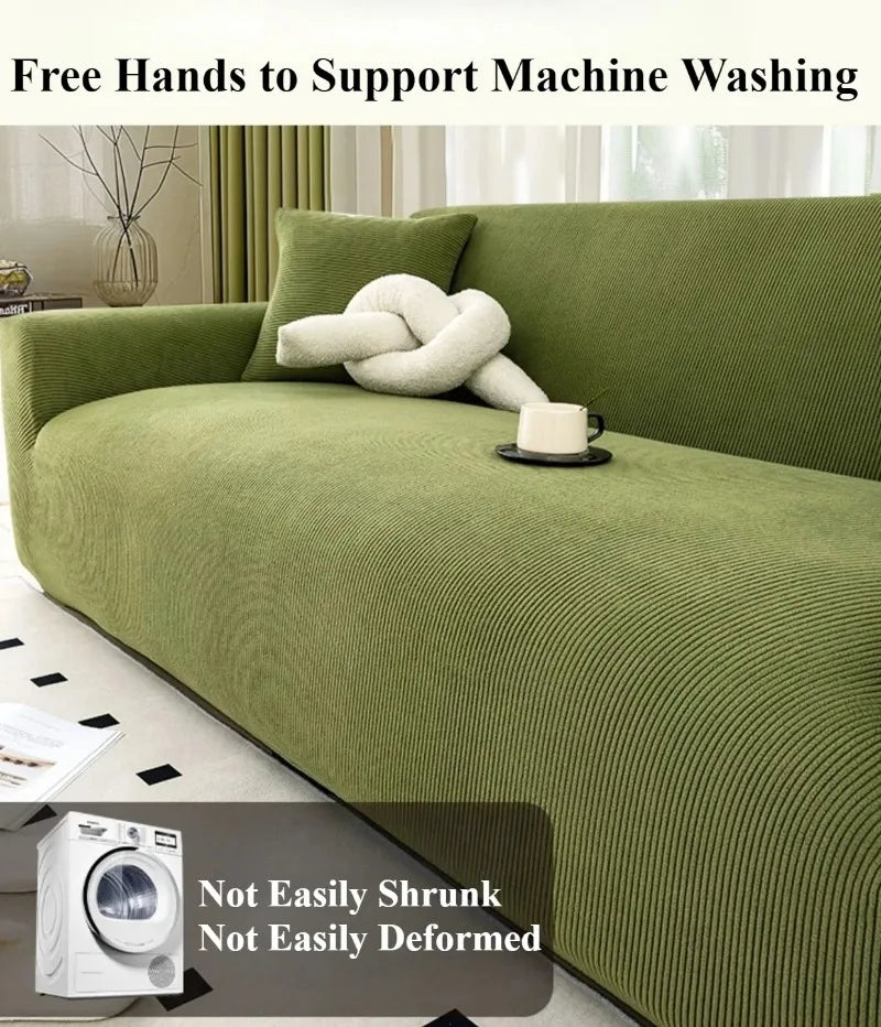 A green stretch jacquard sofa cover is displayed on a sofa, with a washing machine visible in the foreground.