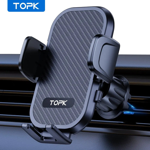 A black car phone mount with a textured surface and a TOPK logo, shown mounted on a car air vent.