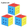 A 3-piece set of a cube puzzle with blue and yellow colored pieces.