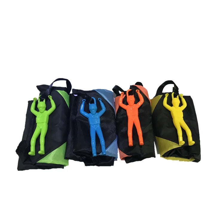 A set of hand-throw parachute toys featuring mini soldiers in green, blue, and orange colors.