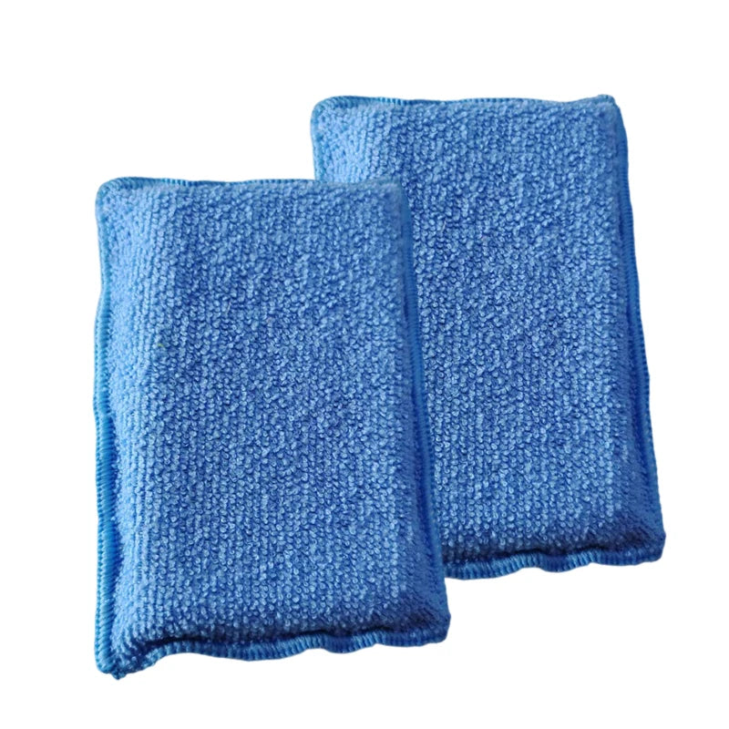 A pair of blue microfiber scrubbing sponges for cleaning car interiors.