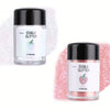 A glass jar of edible glitter powder in pink color with a strawberry illustration.