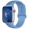 A light blue silicone sport band worn around an Apple Watch.
