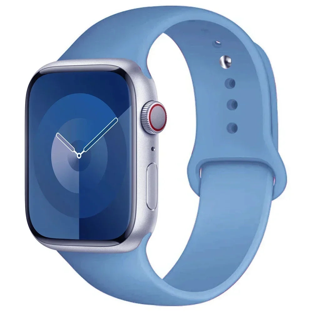 A light blue silicone sport band worn around an Apple Watch.