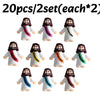 A set of 20 mini Jesus figurines for Easter and religious celebrations, featuring dark hair and white robes.