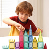 A set of colorful magnetic building tiles for kids, including towers, structures, and vehicles.