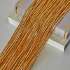 Golden and white tassel string curtain for doorways and room dividers