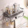 A gray wall-mounted shower caddy with multiple tiers and suction cups is displayed against a light background.