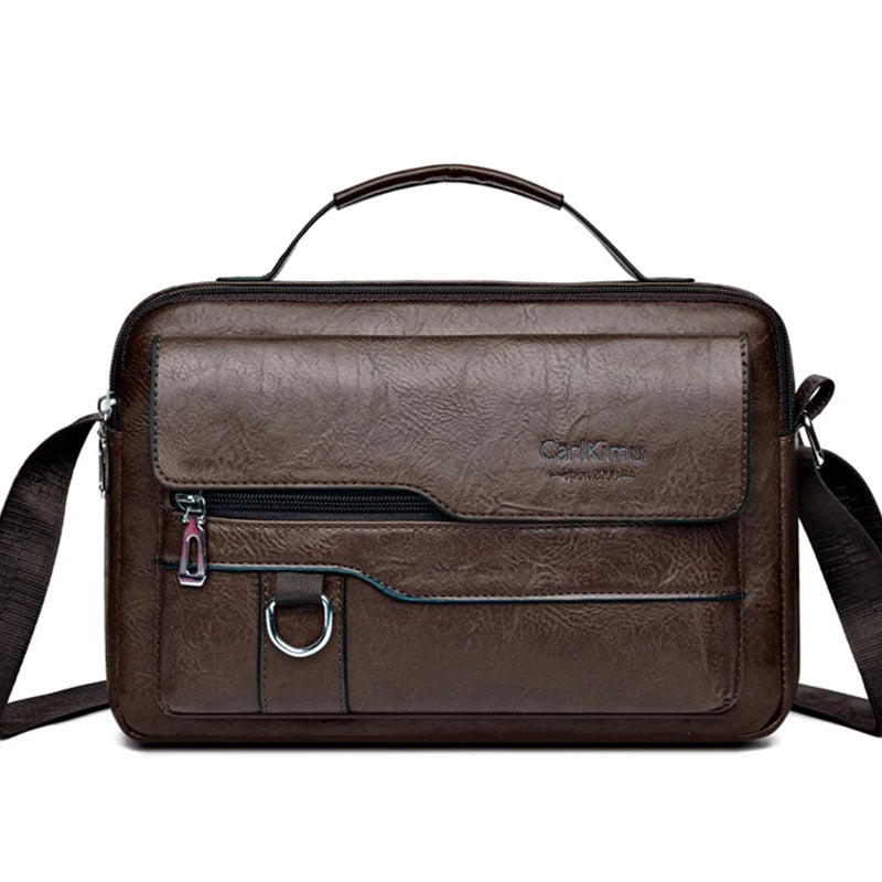 A dark brown faux leather crossbody bag with a top handle and adjustable strap.