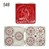 A red dragon design on a rectangular box next to a set of seven metal dice with gyro finish.