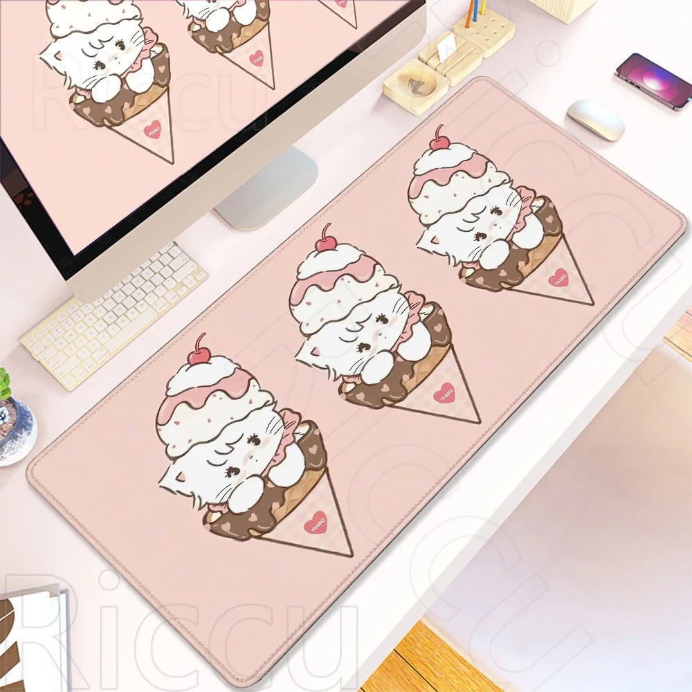 A pink Kawaii cartoon themed gaming desk mat featuring multiple illustrations of fluffy white ice cream cones.
