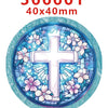 A round stained glass style acrylic cross hair bow decoration with a floral design.