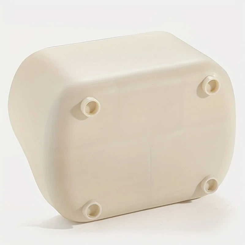 A beige acrylic five-compartment desk organizer viewed from above.