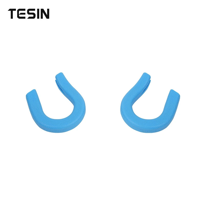 A pair of light blue front bumper tow hook covers for Chevrolet Silverado and GMC Sierra trucks.