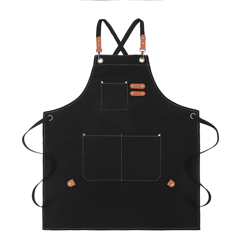 Black professional chef apron with cross-back straps and two tool pockets