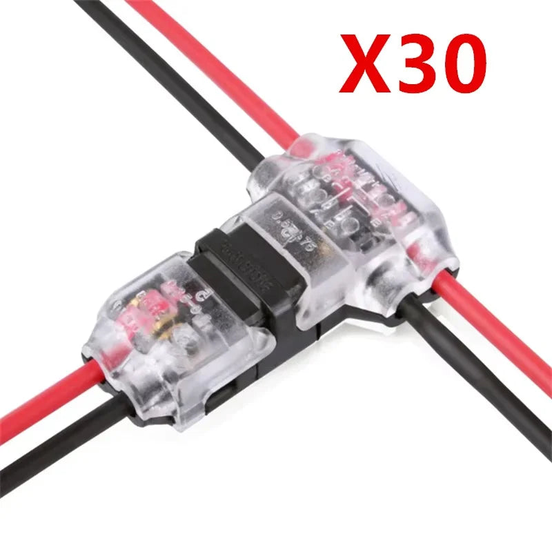A close-up view of three red and black wire connectors with X30 markings.