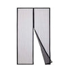A magnetic screen door featuring a hands-free mesh curtain in a vertical striped design.