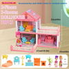 A pink dollhouse with accessories and dolls, including furniture and a small building structure.