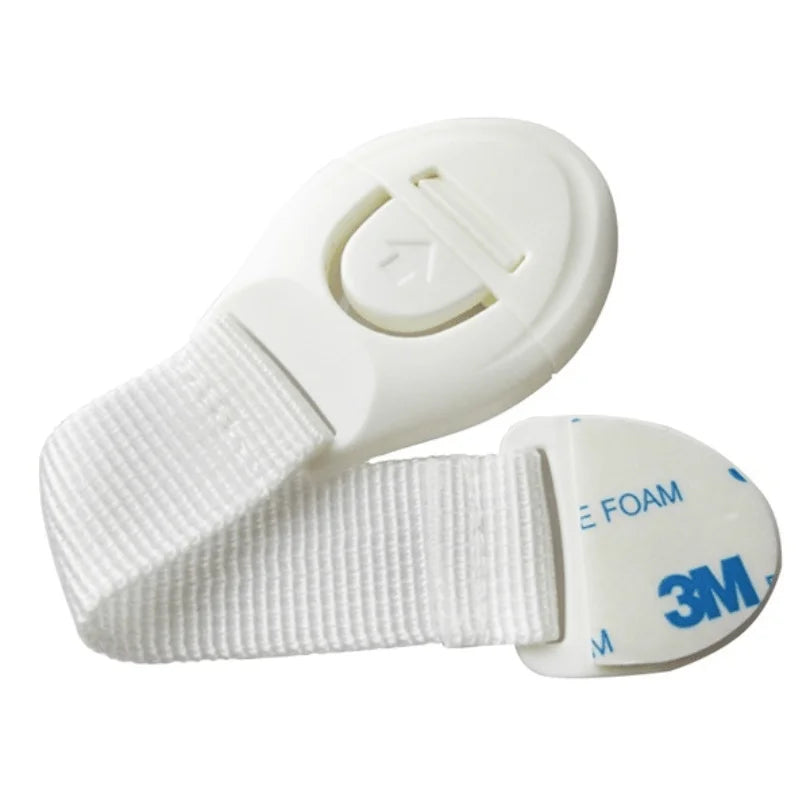 White adhesive baby proofing latch for drawers and cupboards, featuring a silicone foam mechanism.