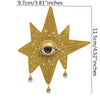 Gold star-shaped patch with a central eye design and dangling beads