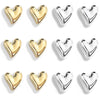 A set of twelve gold and silver mini heart-shaped refrigerator magnets.