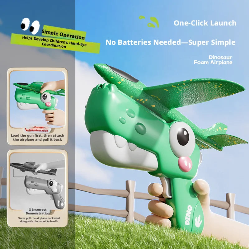 A green dinosaur foam airplane launcher toy set being held by a hand outdoors.