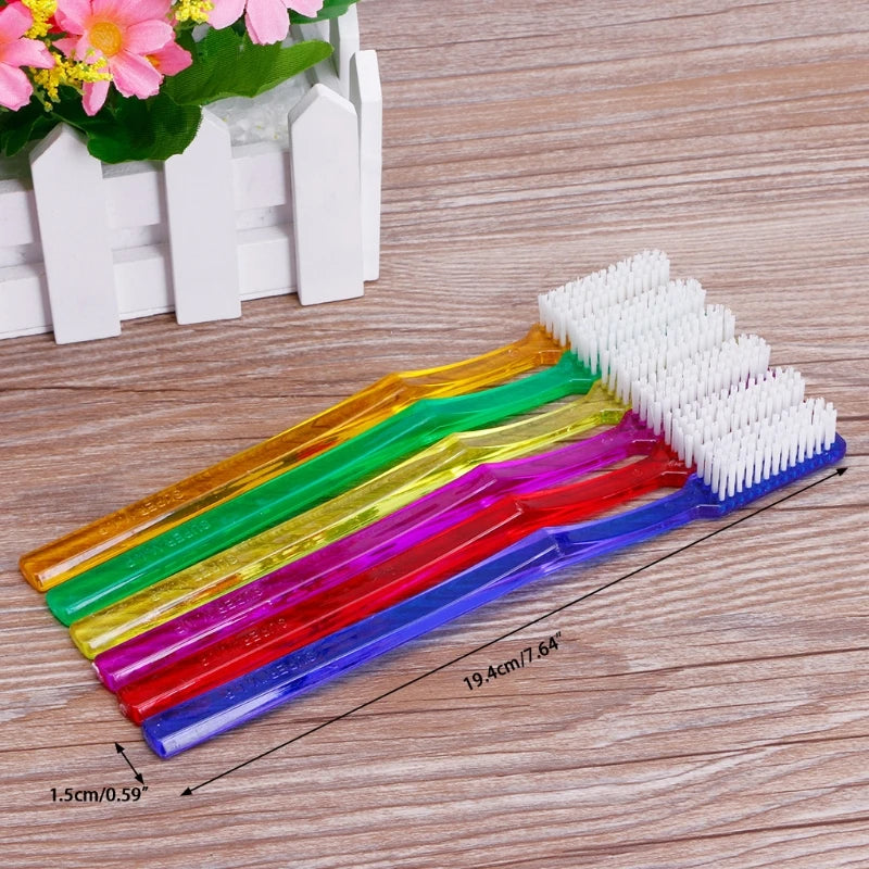 A set of six premium hard bristle toothbrushes in various colors, including pink, green, yellow, purple, red, and blue, displ