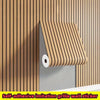 A self-adhesive imitation wood grain grille wall sticker is shown installed on a vertical wooden panel.