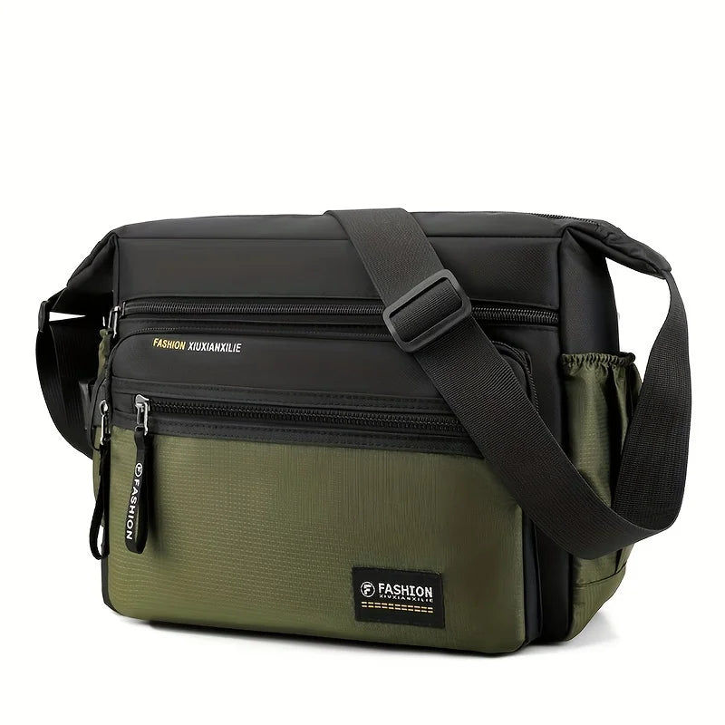 A dark olive green men's water-resistant nylon crossbody sling bag with black straps and zipper details.