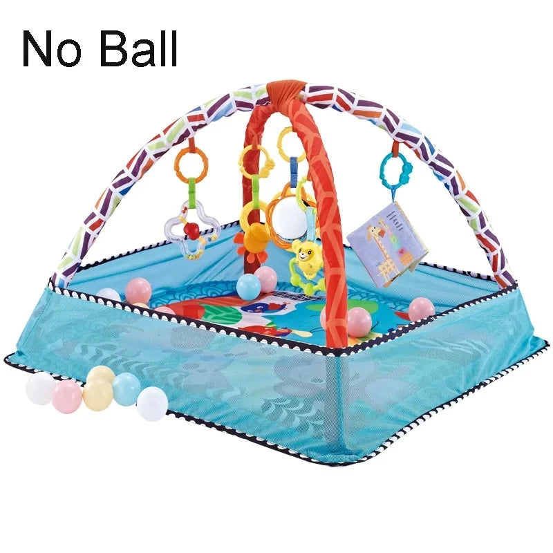 A baby play gym mat featuring an orange arch and colorful hanging toys for infant activity.