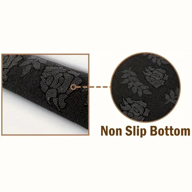 Black non slip bottom doormat with a floral pattern