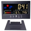 A digital weather station clock displaying time, temperature, and humidity with a black display and a dark gray mounting brac