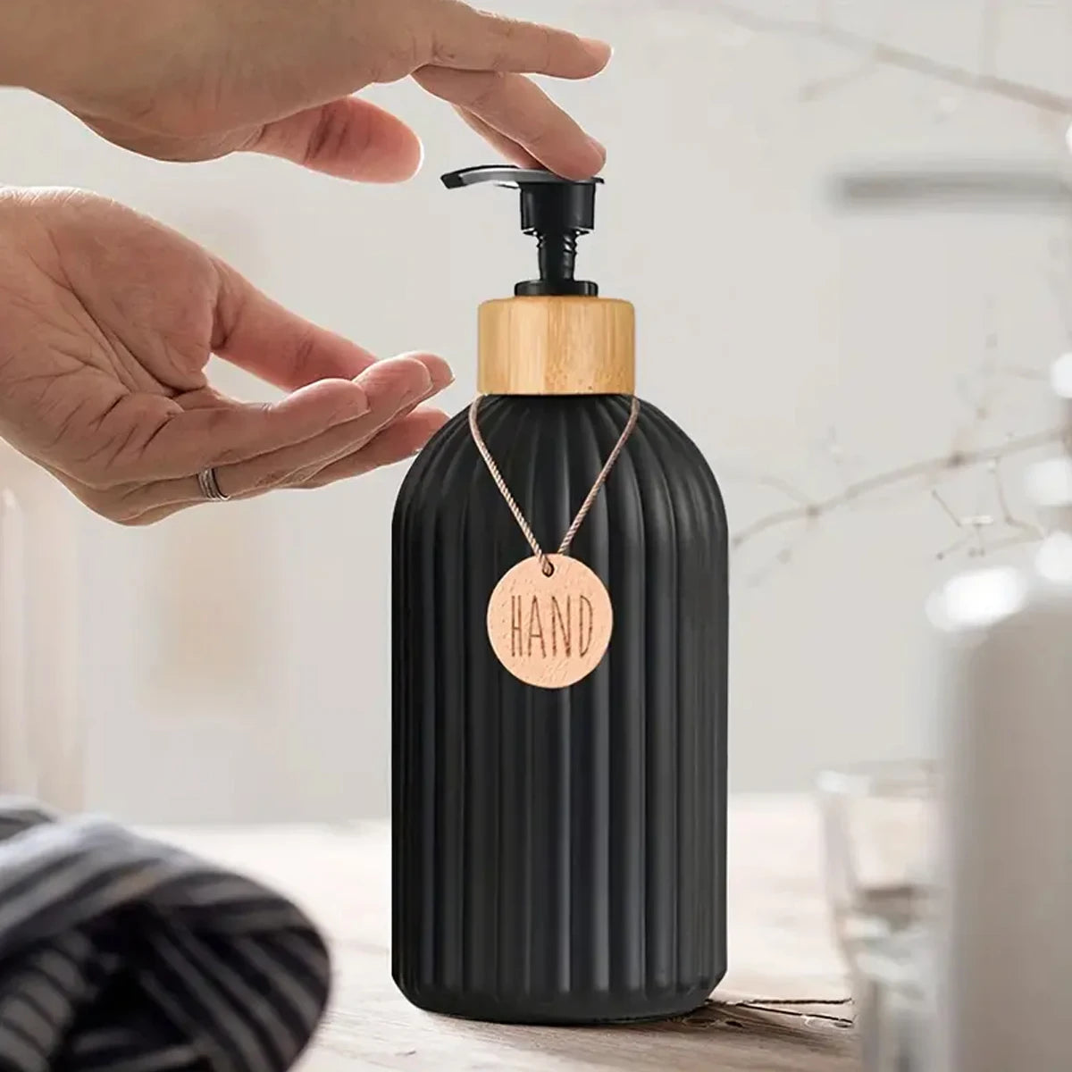 Refillable Matte Black Soap Dispenser with Wooden Tag