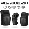 A set of three black wrist guards, knee pads, and elbow pads for sports protection.