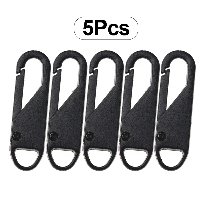 Five black metal zipper slider repair kits packaged together