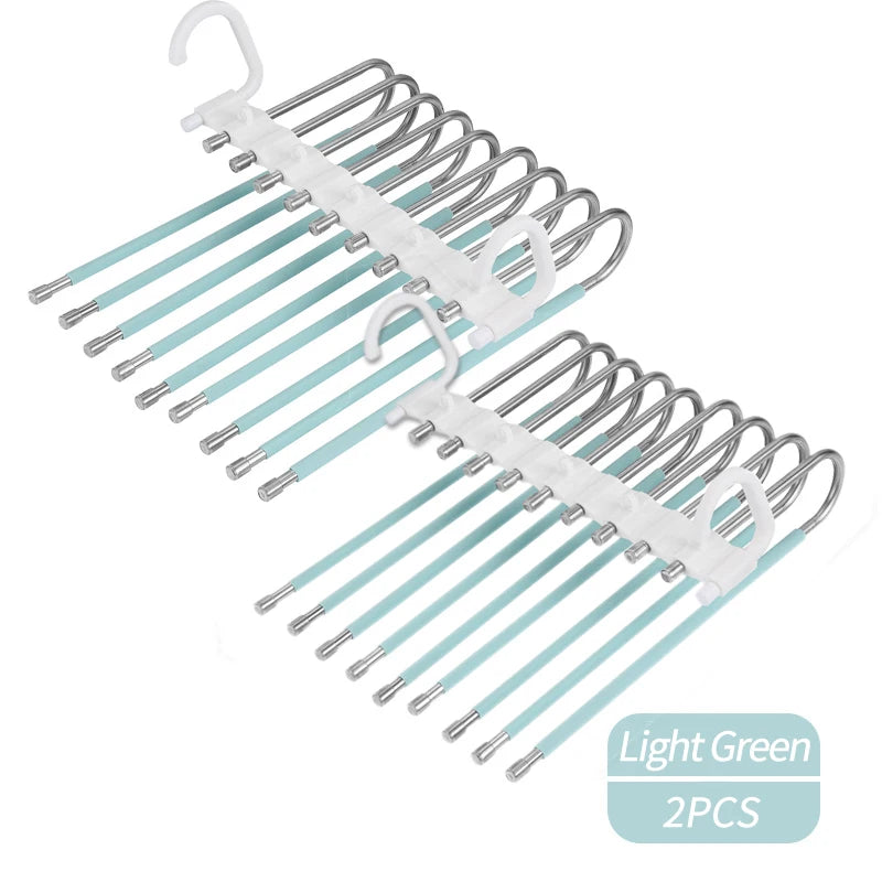 A set of two 9-layer non-slip stainless steel pants hangers in light green color.