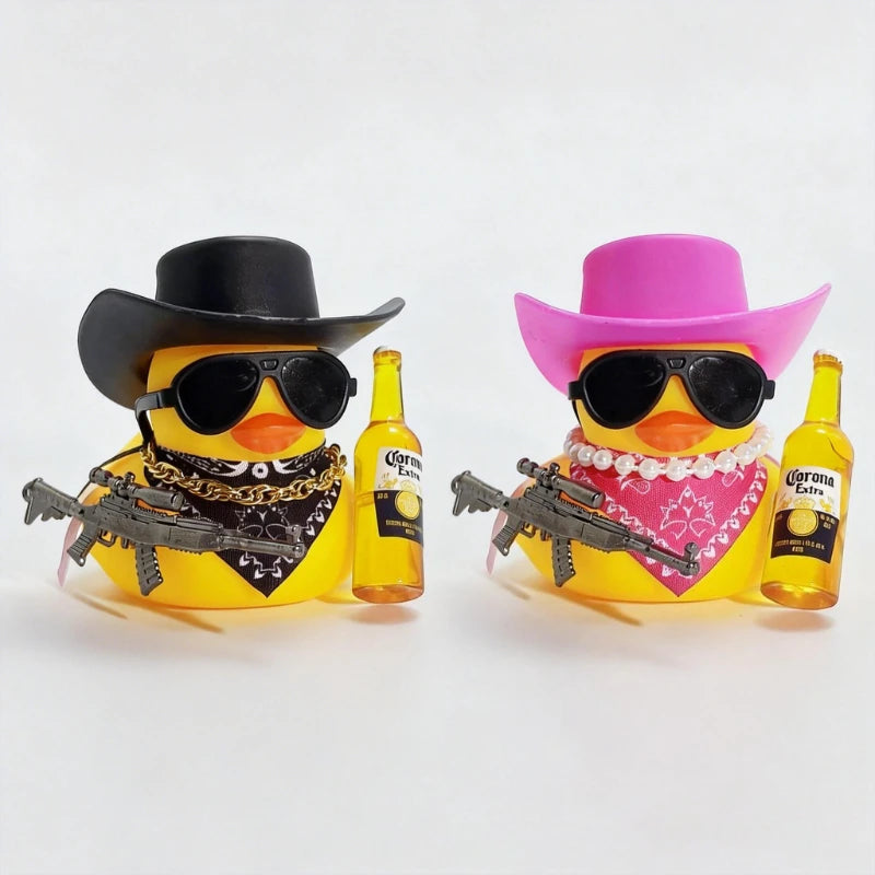 A yellow rubber duck character wearing a cowboy hat and sunglasses is shown with toy guns and bottles on a white background.