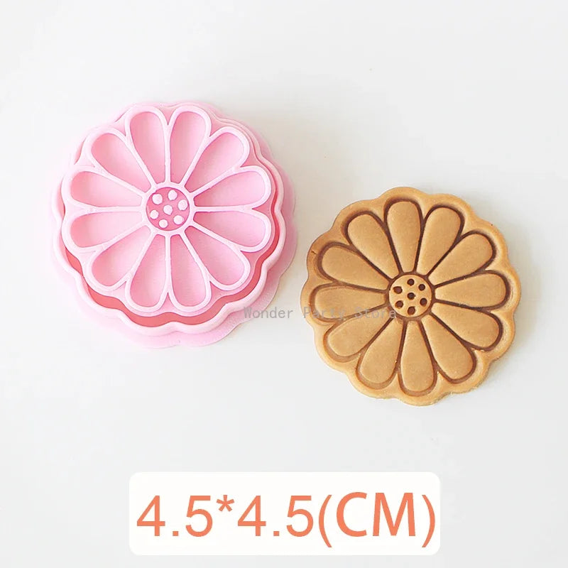 Pink and brown silicone cookie cutters shaped like flowers for baking