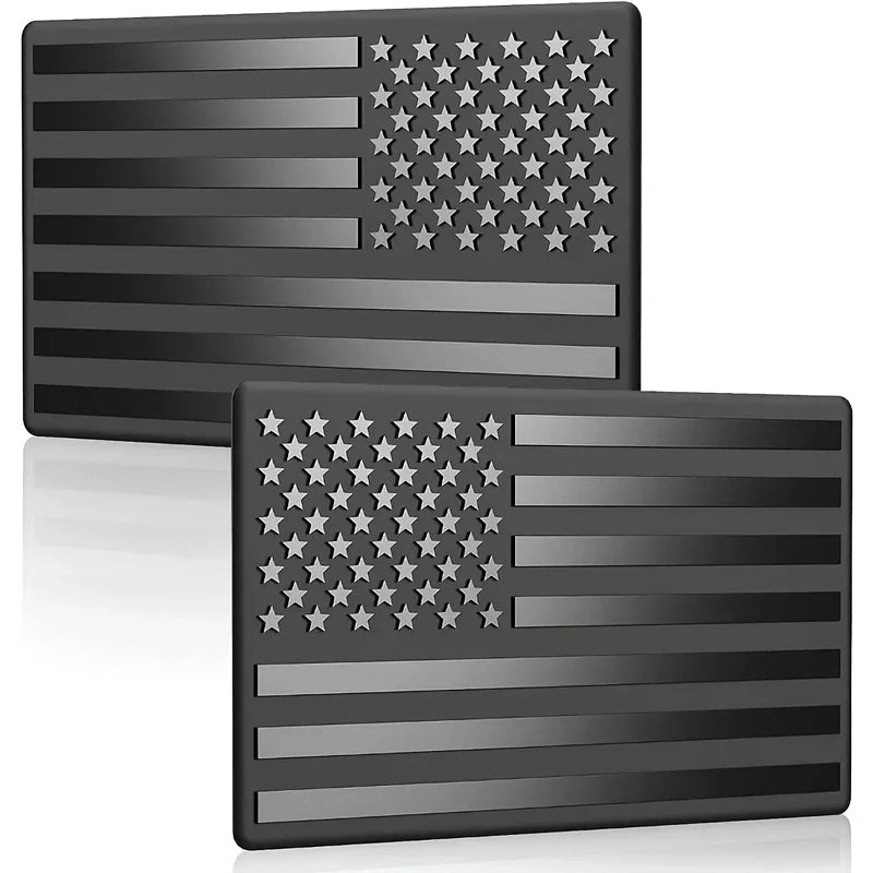Matte black 3D American flag car emblem set featuring stars and stripes design
