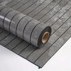 Roll of extra thick 3D wood grain self-adhesive wallpaper laid out on a gray tiled surface.