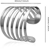 A set of twelve silver metal napkin rings with a decorative hollow-out pattern.