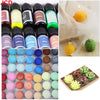 A collection of 18 concentrated liquid candle dyes in various colors, including yellow, green, and purple shades.