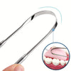A stainless steel tongue scraper is shown being used to clean the tongue of a person.